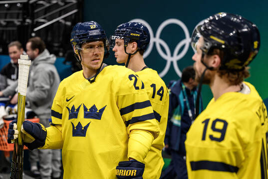 Hampus Lindholm of Sweden at an ice hockey practice session