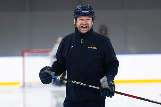 Assistant coach Stefan Ladhe of Sweden at a ice hockey