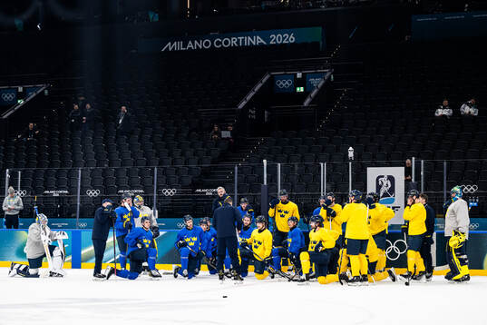 Players of Sweden at an ice hockey practice session