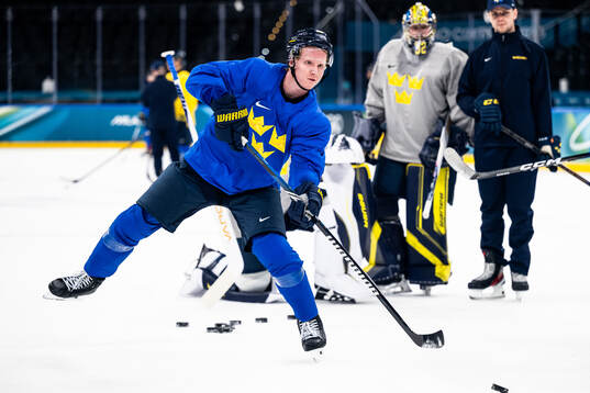 Rasmus Dahlin of Sweden at an ice hockey practice session