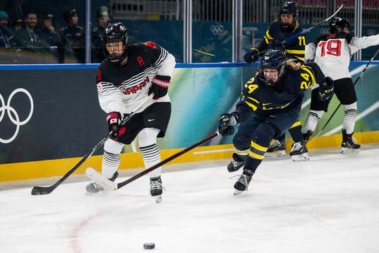 Akane Hosoyamada of Japan and Ebba Hedqvist of Sweden in