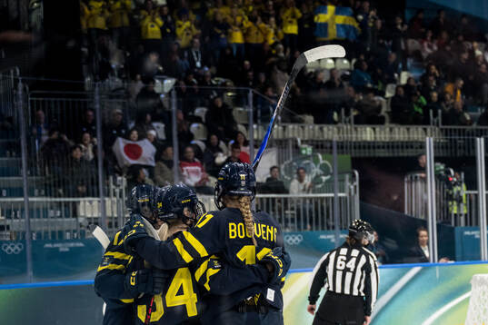 Mira Hallin and Josefin Bouveng of Sweden celebrate