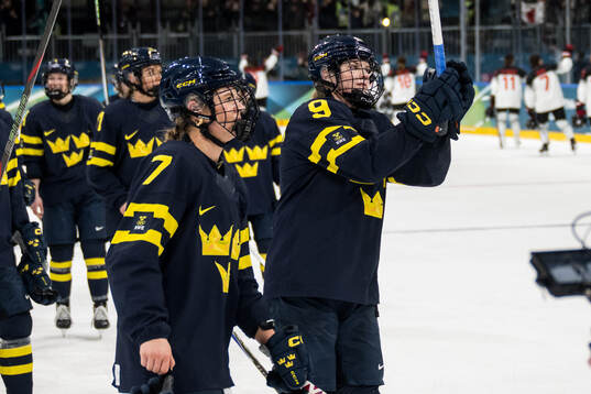 Mira Jungåker and Jessica Adolfsson of Sweden celebrate