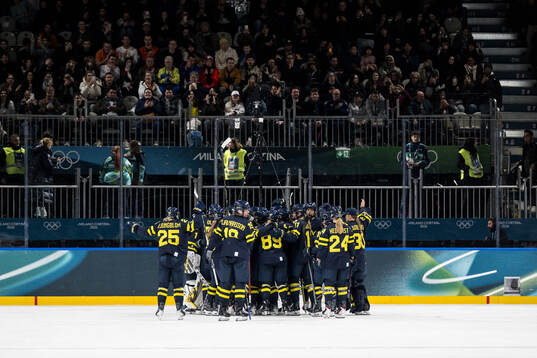 Players of Sweden celebrate