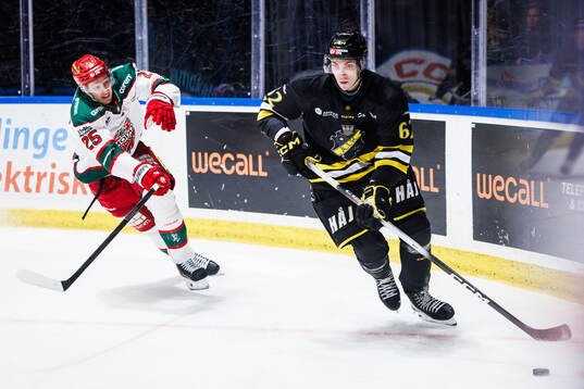 Modos Carl Mattsson och AIKs Simon Åkerström