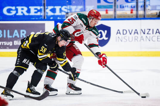 AIKs Oskar Magnusson och Modos Carl Mattsson