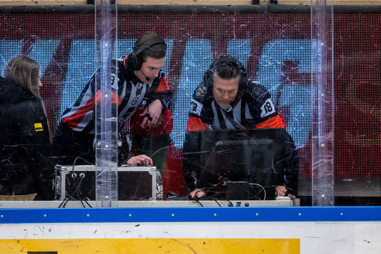 Domare Filip Eriksson och Domare Mikael Nord