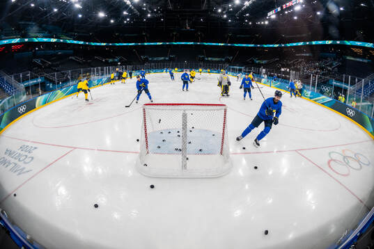 Players of Sweden at an ice hockey practice session in