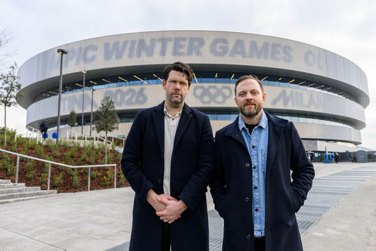 Swedish journalists Carl Juborg and Henrik Sjöberg pose