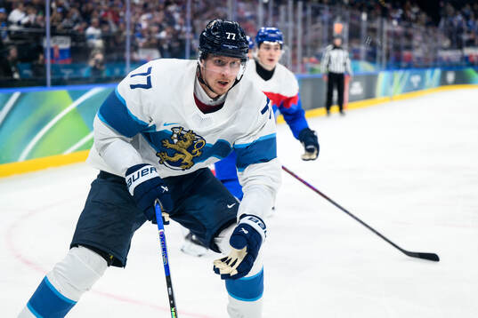 Niko Mikkola of Finland in the men's ice hockey game