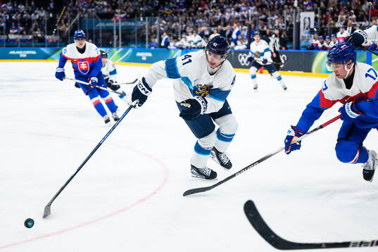 Miro Heiskanen of Finland and Simon Nemec of Slovakia in