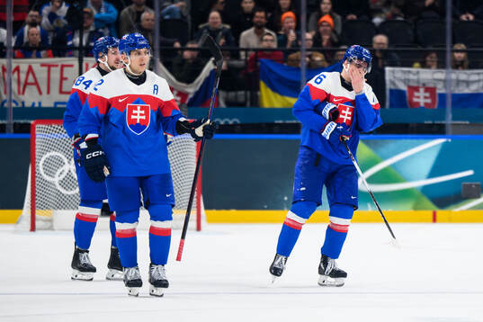 Martin Pospisil of Slovakia in pain in the men's ice hockey