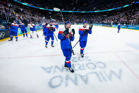 Oliver Okuliar and Dalibor Dvorsky of Slovakia celebrate