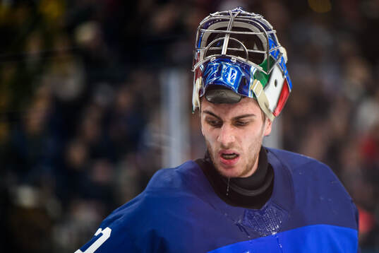 Damian Clara of Italy in the men's ice hockey game between