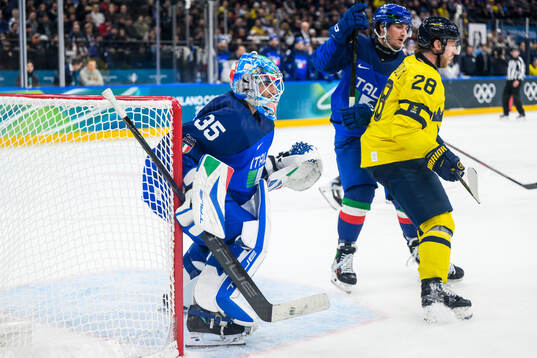 Davide Fadani of Italy in the men's ice hockey game between