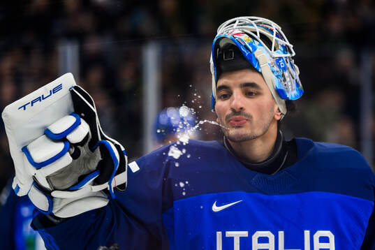Davide Fadani of Italy in the men's ice hockey game between