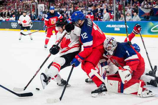 Mitch Marner of Canada against Radek Faksa and goaltender