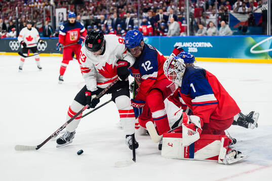 Mitch Marner of Canada against Radek Faksa and goaltender