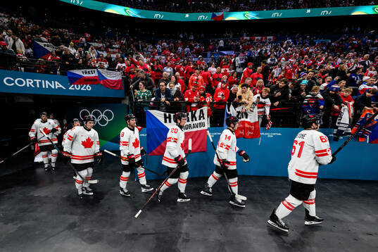Thomas Harley, Bo Horvat and Mark Stone of Canada in the