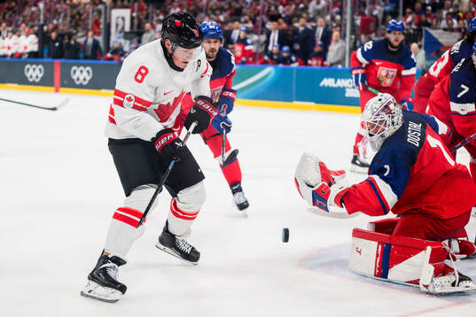 Cale Makar of Canada against goaltender Lukas Dostal of
