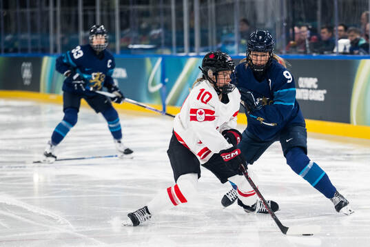 Sarah Fillier of Canada and Nelli Laitinen of Finland in