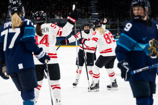 Kristin O'Neill of Canada celebrates