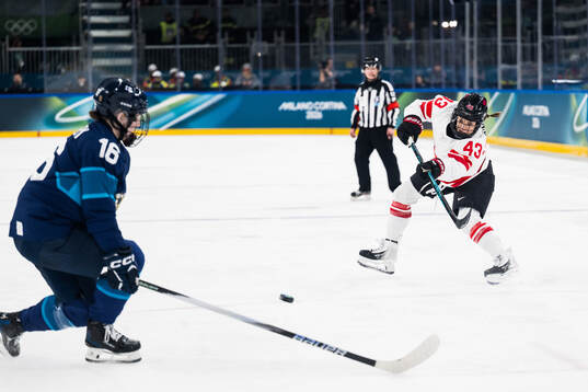 Kristin O'Neill of Canada scores 0-3 in the women's ice