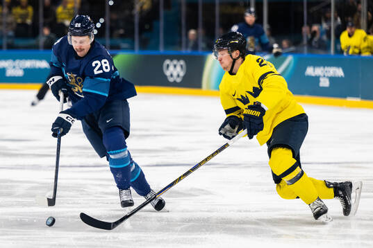 Eeli Tolvanen of Finland and Lucas Raymond of Sweden in the