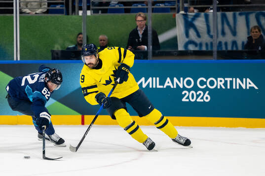 Artturi Lehkonen of Finland and Filip Forsberg of Sweden in