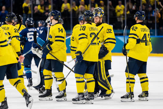 Goaltender Filip Gustavsson of Sweden looks dejected