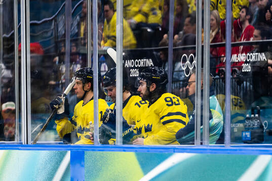 Joel Eriksson Ek, Adrian Kempe and Mika Zibanejad of Sweden