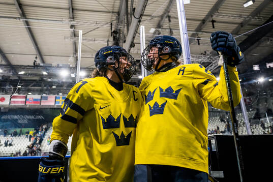 Anna Kjellbin and Hanna Olsson of Sweden celebrate