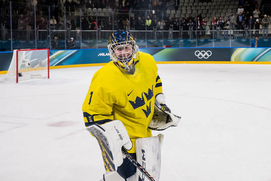 Goaltender Ebba Svensson Träff of Sweden celebrate