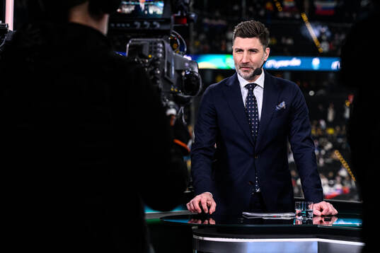 Björn Oldén of Swedish broadcaster TV4 in the men's ice