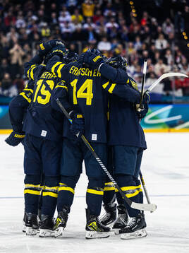 Adrian Kempe of Sweden celebrates 2-1 with teammates in the