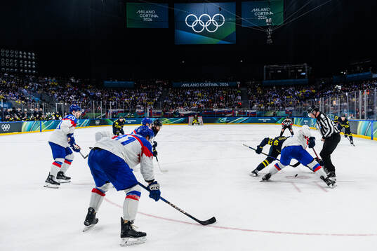 Face off in the men's ice hockey game between Sweden and