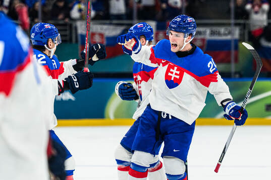 Juraj Slafkovsky of Slovakia celebrate
