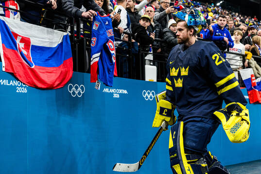 Goaltender Jacob Markström of Sweden looks dejected