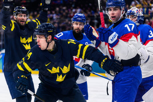 Joel Eriksson Ek of Sweden celebrates 1-0  in the men's ice