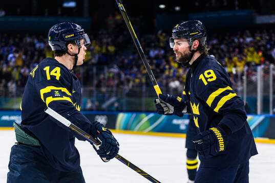 Joel Eriksson Ek and Adrian Kempe of Sweden celebrate 1-0