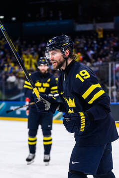 Adrian Kempe of Sweden celebrates 1-0 in the men's ice