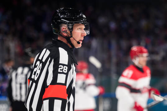 Referee Mikael Holm in the men's ice hockey game between