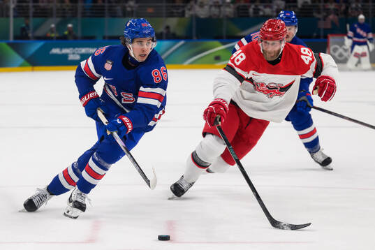 Jack Hughes of USA and Nicholas B Jensen of Denmark in the