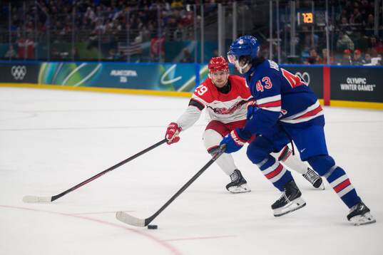 Mikkel Aagaard of Denmark and Quinn Hughes of USA in the