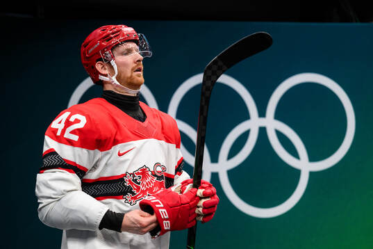 Phillip Bruggisser of Denmark in the men's ice hockey game