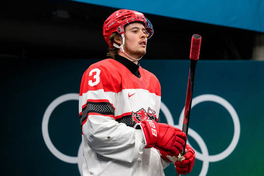 Malte Setkov of Denmark in the men's ice hockey game
