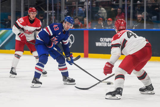 Quinn Hughes of USA and Jesper Jensen Aabo of Denmark in