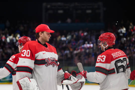Goaltender Mads Søgaard and Patrick Russell  of Denmark