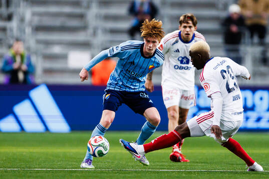 Djurgårdens Peter Langhoff och Vålerenga Brice Ambina