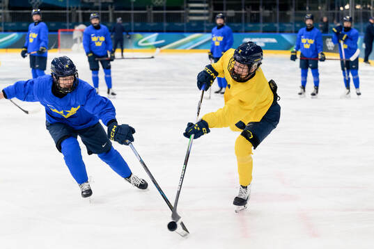 Linnea Andersson and Hilda Svensson of Sweden at an ice